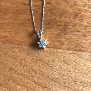 White gold and diamond flower pendant